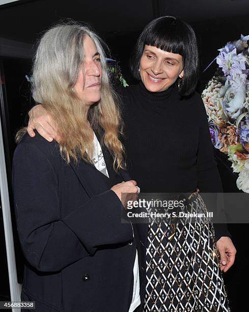 Patti Smith and actress Juliette Binoche attend the Sundance Selects with W Magazine, Moncler and The Cinema Society after party for the NYFF...