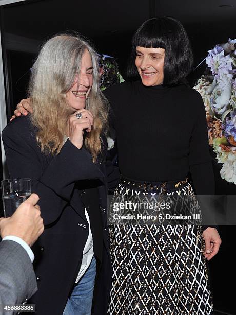 Patti Smith and actress Juliette Binoche attend the Sundance Selects with W Magazine, Moncler and The Cinema Society after party for the NYFF...