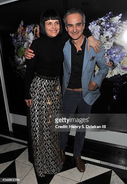 Actress Juliette Binoche and director Olivier Assayas attend the Sundance Selects with W Magazine, Moncler and The Cinema Society after party for the...