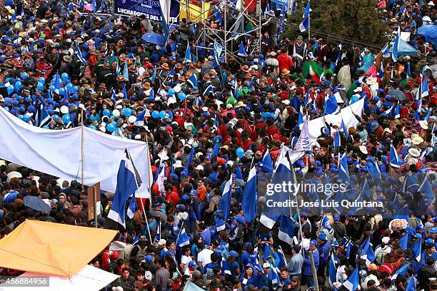 Supporters of Bolivia's president and presidential candidate of the Socialist Movement, Evo Morales attend the closing ceremony of his presidential...