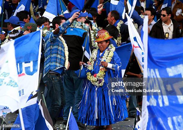 Supporters of Bolivia's president and presidential candidate of the Socialist Movement, Evo Morales attend the closing ceremony of his presidential...