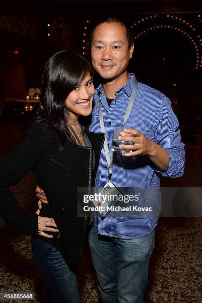 Mimi Pham and Zappos.com CEO Tony Hsieh attend the Vanity Fair New Establishment Summit Cockatil Party on October 8, 2014 in San Francisco,...