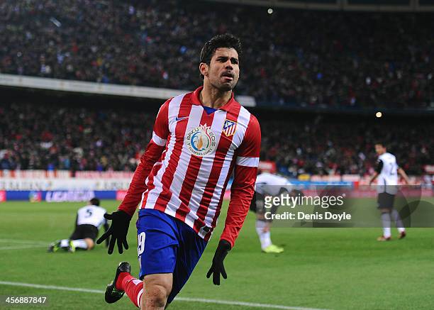 Diego Costa of Club Atletico de Madrid celebrates after scoring Atletico's opening goal during the La Liga match between Club Atletico de Madrid and...