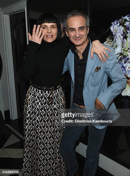 Juliette Binoche and director Olivier Assayas attend the after party for the premiere of "Clouds Of Sils Maria" hosted by Sundance Selects with W...