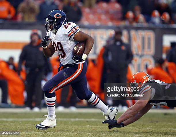 Running back Michael Bush of the Chicago Bears scores a touchdown as he runs by defensive lineman Phil Taylor of the Cleveland Browns at FirstEnergy...