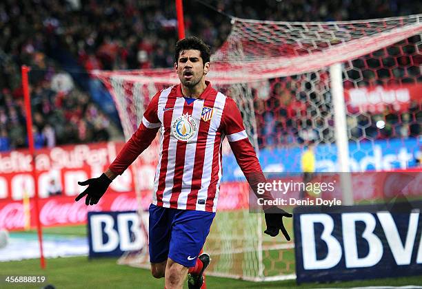 Diego Costa of Club Atletico de Madrid celebrates after scoring Atletico's 3rd goal during the La Liga match between Club Atletico de Madrid and...