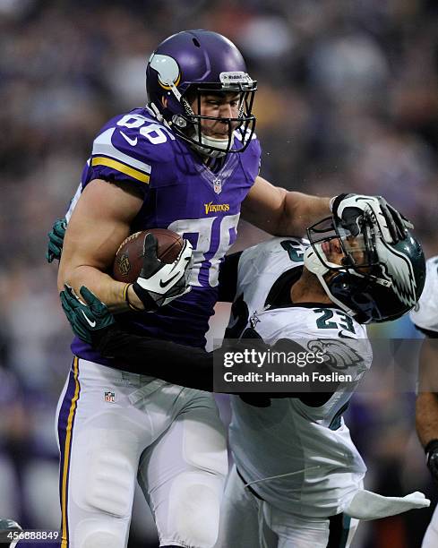 Chase Ford of the Minnesota Vikings carries the ball against Patrick Chung of the Philadelphia Eagles during the fourth quarter of the game on...