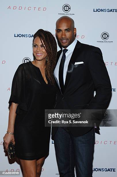 Actress Nicole Ari Parker and Boris Kodjoe attend the New York Premiere of "Addicted" at Regal Union Square on October 8, 2014 in New York City.