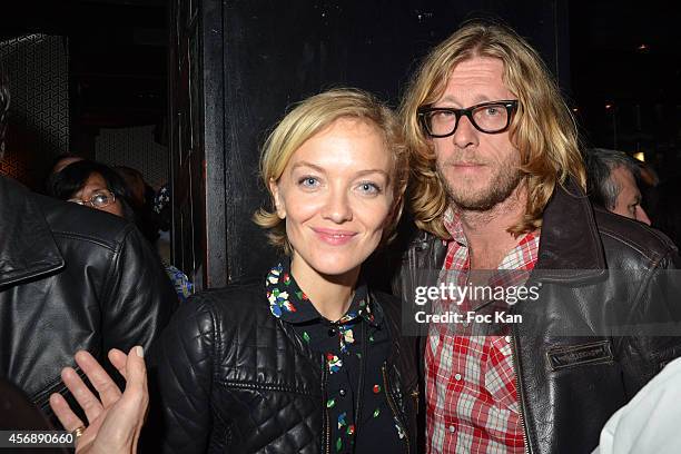 Bass guitarist Cyril Denis and Maya Lauque attend 'Les Invites de La Fete-30 Ans D'Histoires A Canal +' Philippe Dana and Leon Marcadet Book Launch...