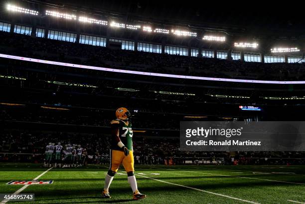 Nose tackle Ryan Pickett of the Green Bay Packers walks off the field against the Dallas Cowboys during a game at AT&T Stadium on December 15, 2013...