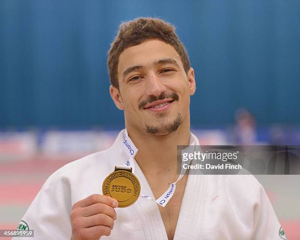 Ashley McKenzie of Camberley JC proudly shows his u60kg gold medal during the British Senior Judo Championships Sunday, December 15, 2013 at the...