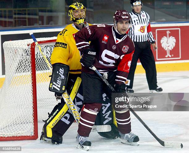 Tomas Rolinek of HC Sparta Prague is in front of the Eero Kilpeläinen of Kalpa Kuopio net during the Champions Hockey League group stage game between...