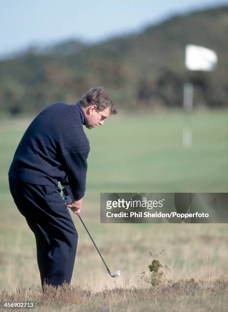 Prince Andrew of Great Britain hitting out of the rough during the Alfred Dunhill Cup Pro-Am Golf Competition held at the St Andrews Golf Course,...
