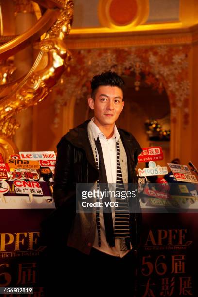 Actor Edison Chen arrives at The 56th Asia-Pacific Film Festival Awards Presentation Ceremony Red Carpet at The Venetian Macao on December 15, 2013...