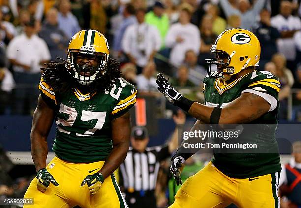 Running back Eddie Lacy celebrates a fourth quarter touchdown with defensive end Mike Daniels of the Green Bay Packers against the Dallas Cowboys...