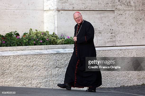 Archbishop of New York Cardinal Timothy Dolan arrives at the Synod Hall for the fourth day of the Synod on the themes of family on October 9, 2014 in...
