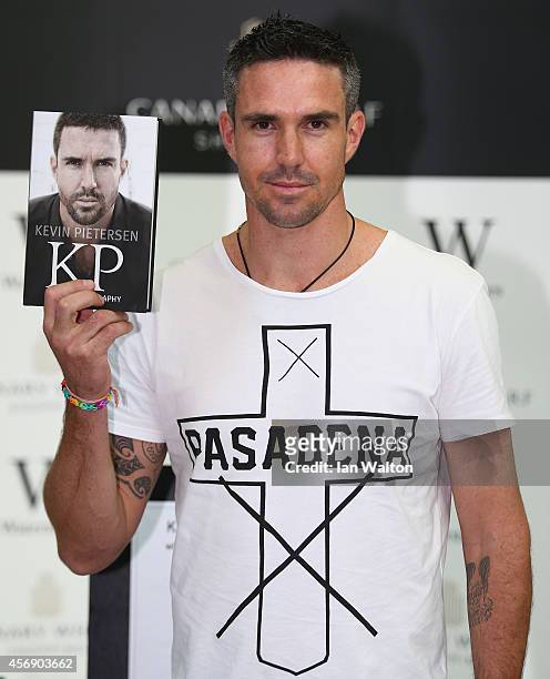 Kevin Pietersen poses during his book signing at Waterstones Canary Wharf Jubilee on October 9, 2014 in London, England.