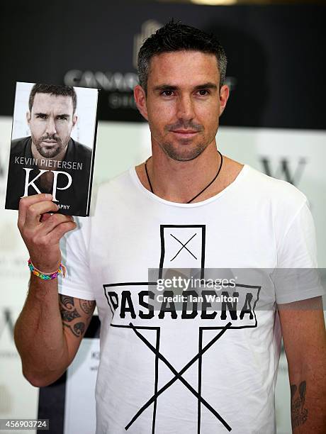 Kevin Pietersen poses during his book signing at Waterstones Canary Wharf Jubilee on October 9, 2014 in London, England.