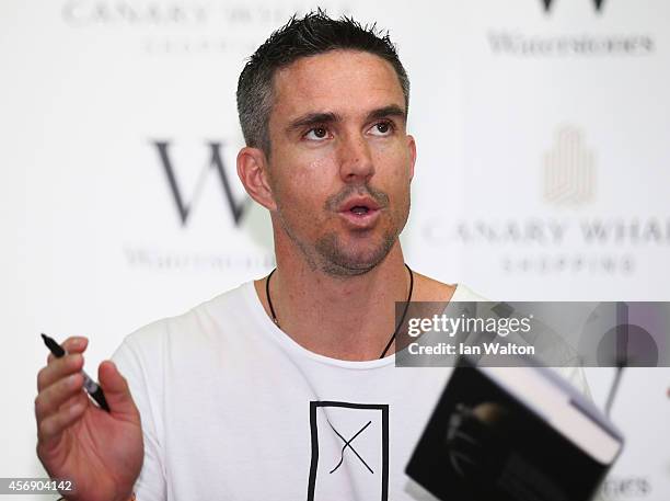 Kevin Pietersen poses during his book signing at Waterstones Canary Wharf Jubilee on October 9, 2014 in London, England.