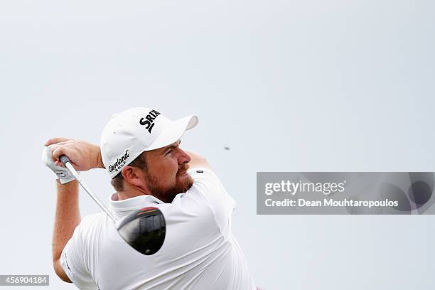 Shane Lowry of Ireland hits his tee shot on the 3rd hole during Day 1 of the Portugal Masters held at the Oceanico Victoria Golf Course on October 9,...