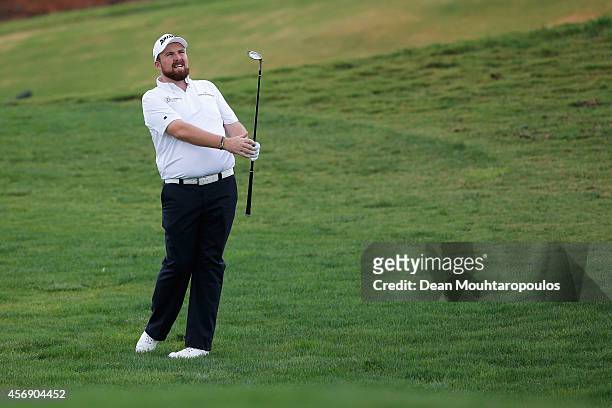 Shane Lowry of Ireland hits his tee second on the 2nd hole during Day 1 of the Portugal Masters held at the Oceanico Victoria Golf Course on October...