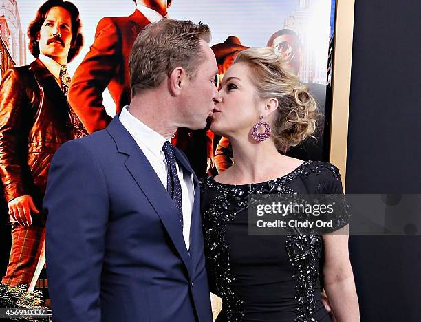 Actress Christina Applegate and husband Martyn LeNoble attend the Anchorman 2: The Legend Continues Premiere, Sponsored by Buffalo David Bitton on...