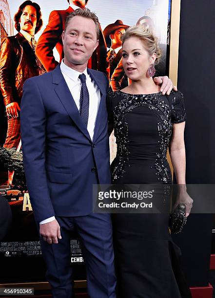 Actress Christina Applegate and husband Martyn LeNoble attend the Anchorman 2: The Legend Continues Premiere, Sponsored by Buffalo David Bitton on...