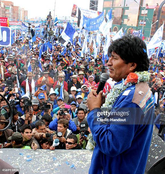 In this handout provided by Ministerio de La Presidencia, president of Bolivia and presidential candidate of the Socialist Movement, Evo Morales...