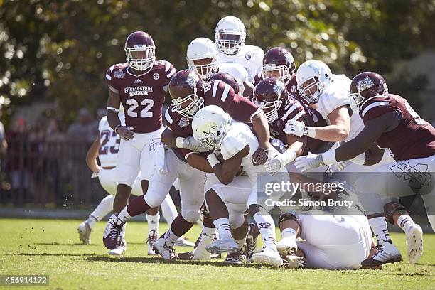 Mississippi State A.J. Jefferson and Nick James in action, making tackle on fourth-and-one vs Texas A&M Trey Williams during 1st quarter at Davis...