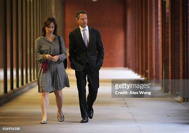 Former U.S. Secretary of the Treasury Timothy Geithner leaves U.S. Court of Federal Claims with former Assistant Treasury Secretary for Public...