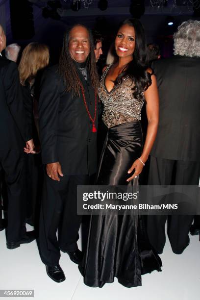 Reverend Michael Beckwith and Omarosa Manigault attend the wedding of Michaele Schon and Neal Schon at the Palace of Fine Arts on December 15, 2013...