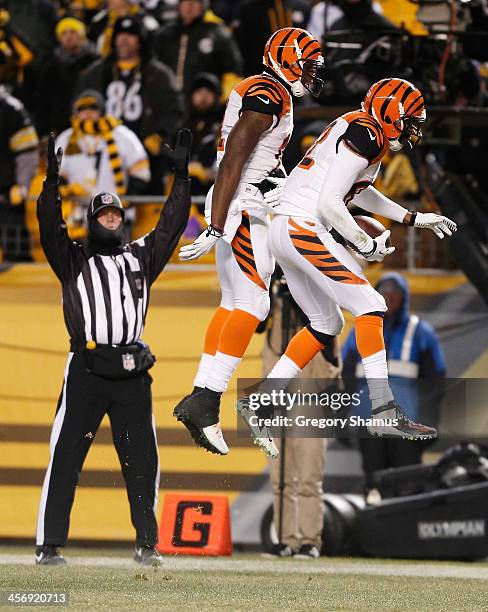 Marvin Jones of the Cincinnati Bengals celebrates his fourth quarter touchdown with Mohamed Sanu while playing the Pittsburgh Steelers at Heinz Field...