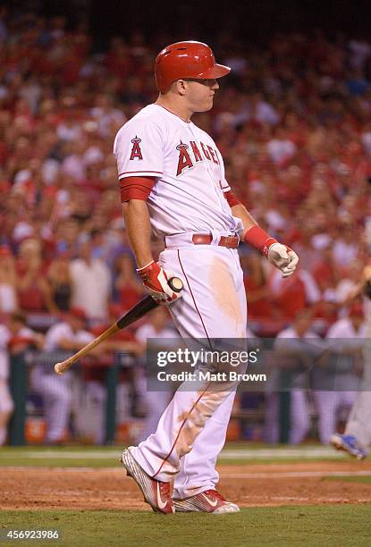 Mike Trout of the Los Angeles Angels of Anaheim reacts to an at bat against the Kansas City Royals during Game 2 of the American League Division...