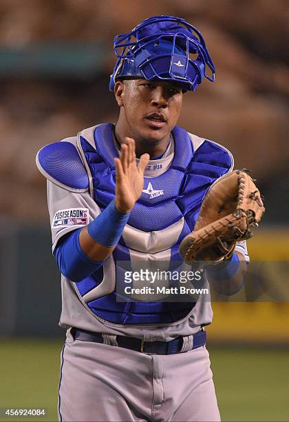 Salvador Perez of the Kansas City Royals claps his hands after the game against the Los Angeles Angels of Anaheim during Game 2 of the American...