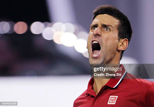 Novak Djokovic of Serbia reacts during his match against Mikhail Kukushkin of Kazakhstan during the day 5 of the Shanghai Rolex Masters at the Qi...