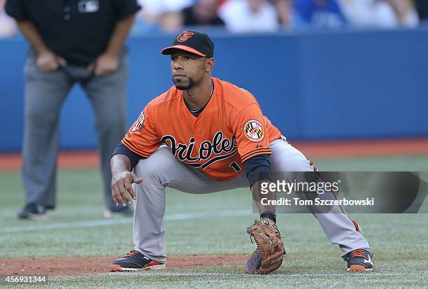 Alexi Casilla of the Baltimore Orioles gets ready to field his position at third base during MLB game action against the Toronto Blue Jays on...