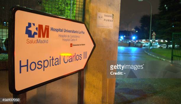 An entry sign at the entrance to the Carlos III hospital is pictured in Madrid on October 8, 2014 where eight people are in quarantine as a...