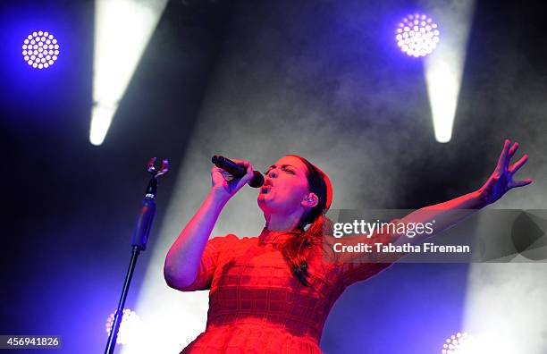 Caro Emerald performs on stage at Brighton Centre on October 9, 2014 in Brighton, United Kingdom.