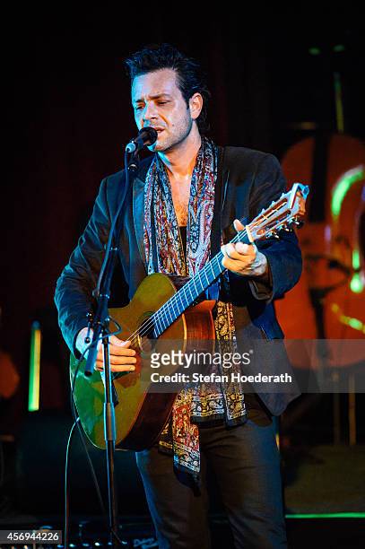 Canadian singer Adam Cohen performs live on stage during a concert at Tempodrom on October 9, 2014 in Berlin, Germany.