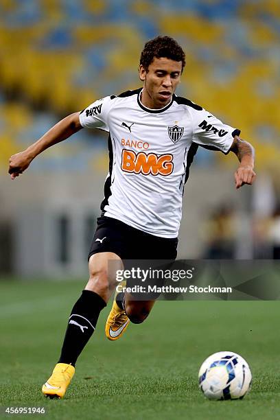 Marcos Rocha of Atletico MG advances the ball and during a match between Fluminense and Atletico MG as part of Brasileirao Series A 2014 at Maracana...