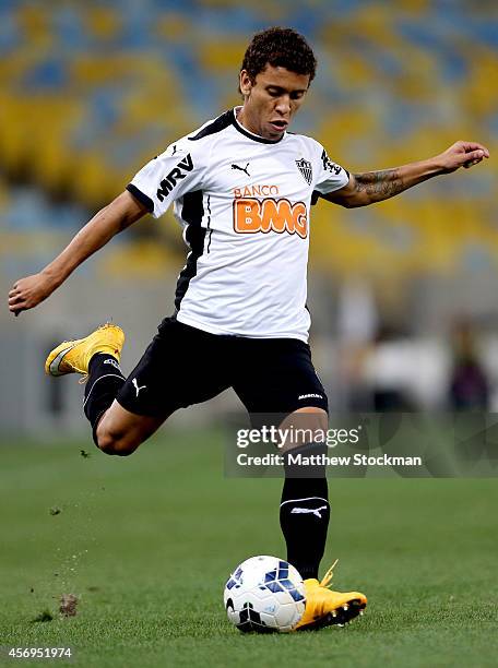 Marcos Rocha of Atletico MG advances the ball and during a match between Fluminense and Atletico MG as part of Brasileirao Series A 2014 at Maracana...