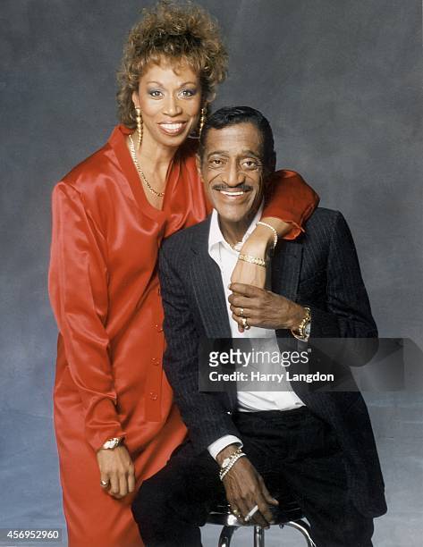 Actor Sammy Davis Jr. And wife Altovise pose for a portrait in 1988 in Los Angeles, California.