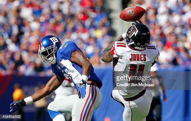 Julio Jones of the Atlanta Falcons can't come up with the ball against Dominique Rodgers-Cromartie of the New York Giants on October 5, 2014 at...