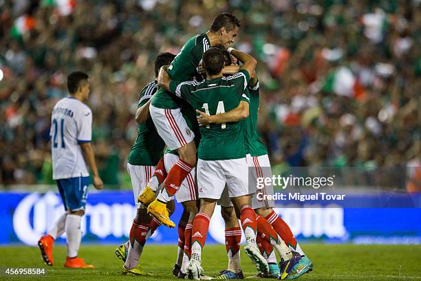 Oswaldo Alanis of Mexico celebrates with teammates after scoring during a friendly match between Mexico and Honduras at Victor Manuel Reyna Stadium...