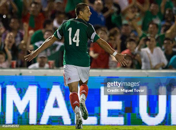 Javier Hernandez of Mexico celebrates after scoring during a friendly match between Mexico and Honduras at Victor Manuel Reyna Stadium on October 09,...