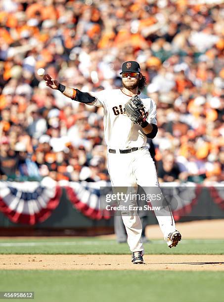 Brandon Crawford of the San Francisco Giants in action against the Washington Nationals during game 3 of the National League Division Series at AT&T...