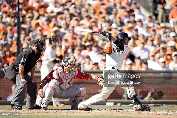 Brandon Crawford of the San Francisco Giants bats against the Washington Nationals during game 3 of the National League Division Series at AT&T Park...