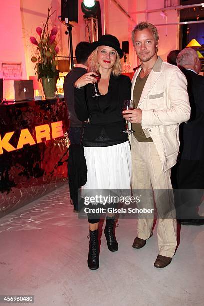 Eva Maria Grein von Friedl and husband Christoph von Friedl attend the grand opening of KARE Kraftwerk on October 9, 2014 in Munich, Germany.