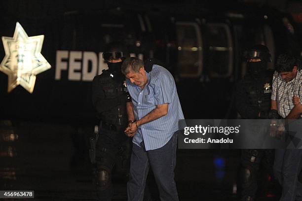 Alleged Juarez Cartel boss Vicente Carrillo Fuentes, alias El Viceroy, brother of the late Mexican drug lord Amado Carrillo, is escorted to a...