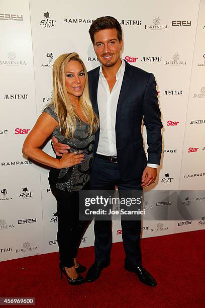 Adrienne Maloof and Jacob Busch arrive at the Star Magazine Scene Stealers Event at Lure on October 9, 2014 in Hollywood, California.